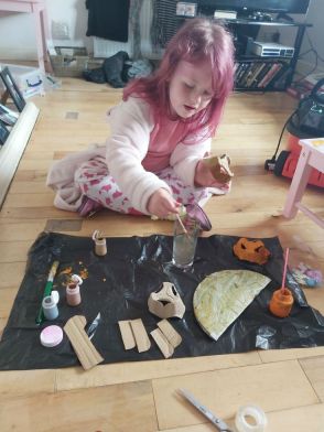 Mia Rose made a super dinosaur out of cardboard!