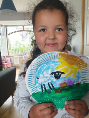 Nola from Mrs Devlin's P1 class painted a lovely farm scene on a paper plate