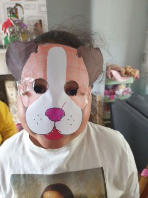 Nola making a farm animal mask